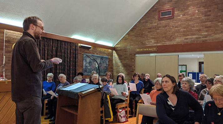 Alex Paxton leading an Adopt a Composer workshop with Haslingfield Choir