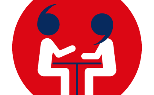 two cartoon figures sitting across a table talking