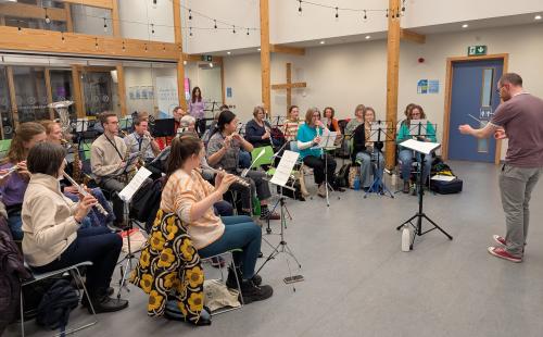 Katrine Aziz with the Redland Wind Band for the Adopt a Music Creator Project