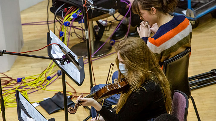 Two students playying their instruments