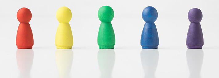 Little figures of generic people in different colours (red, yellow, green, blue, purple)