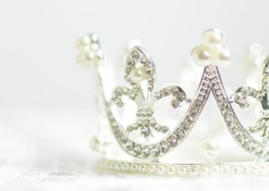 White background with silver and pearl crown