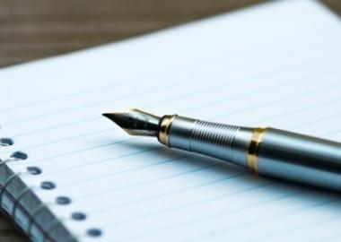 Plain lined paper and fountain pen