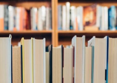 Books in a line page side up