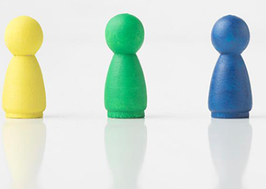 Little figures of generic people in different colours (red, yellow, green, blue, purple)