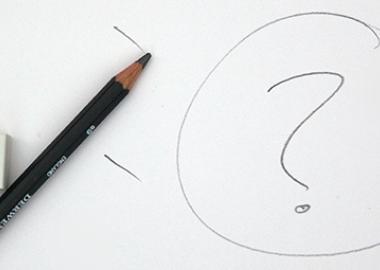 pencil and rubber with a question mark