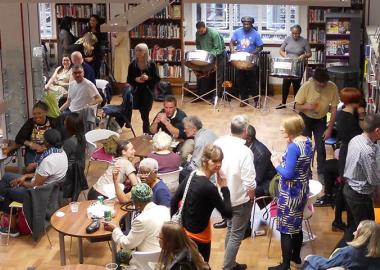 Library users socialise with a musical backdrop