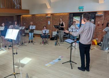 Edgar Divver conducting the Bedfordshire Woodwind Academy Flute Ensemble